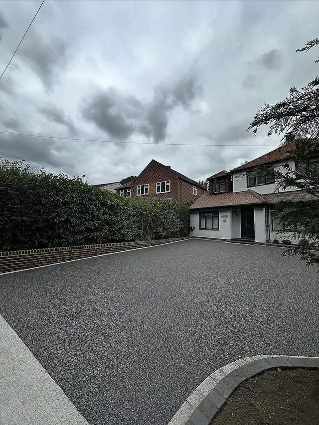 Resin bound driveway installed in Daltex Dark Grey finish