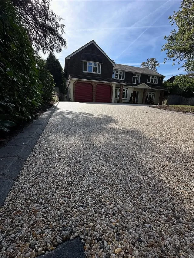Resin bound driveway installed in Daltex Golden Pearl finish