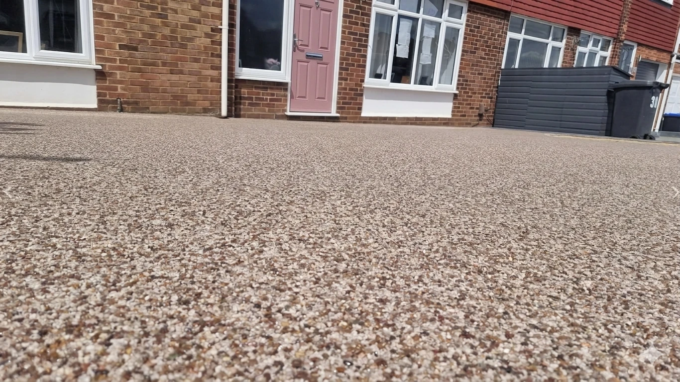 Resin bound driveway installed in Daltex Pink Opal finish
